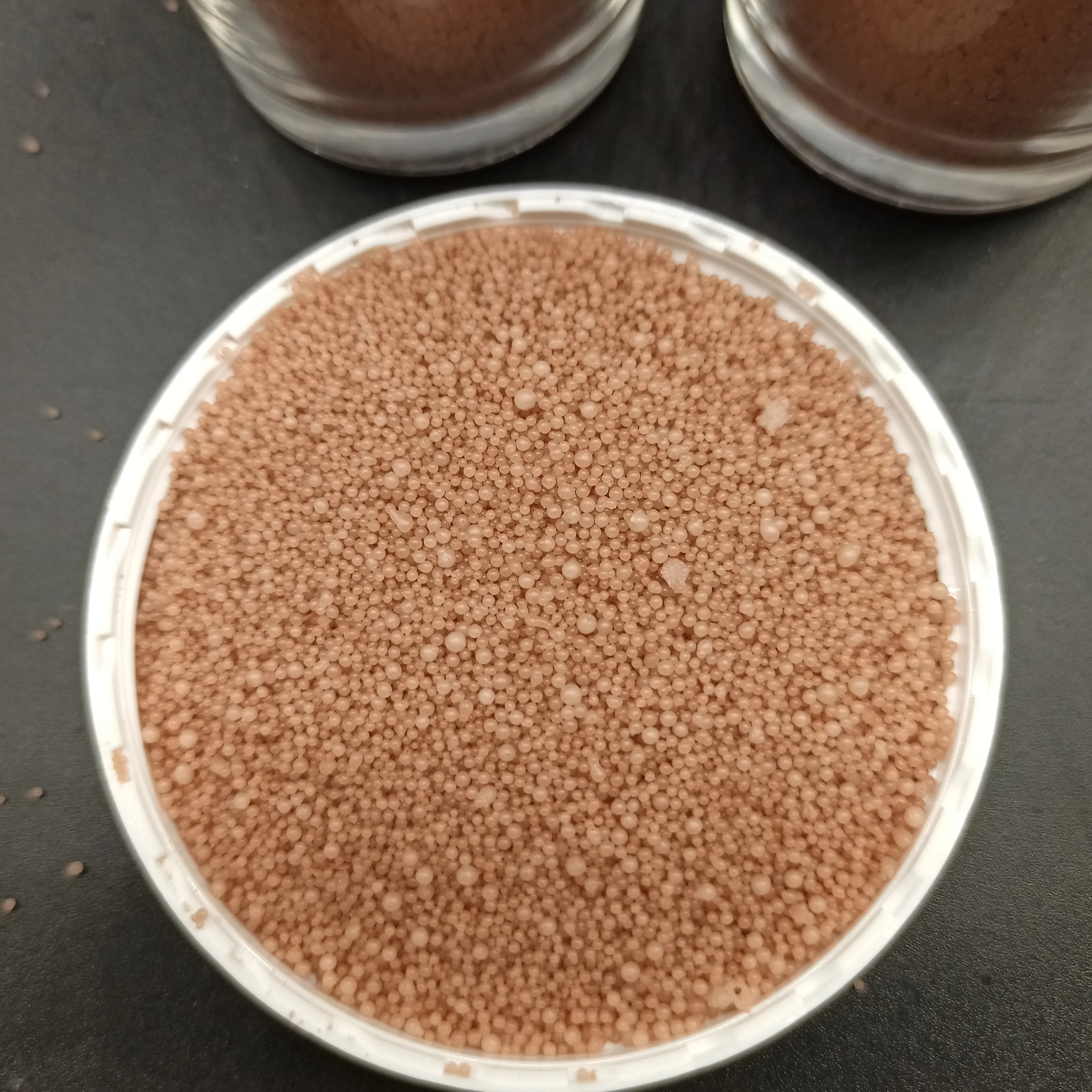 Plant based powder candle wax sand in colors orange pink desert rose