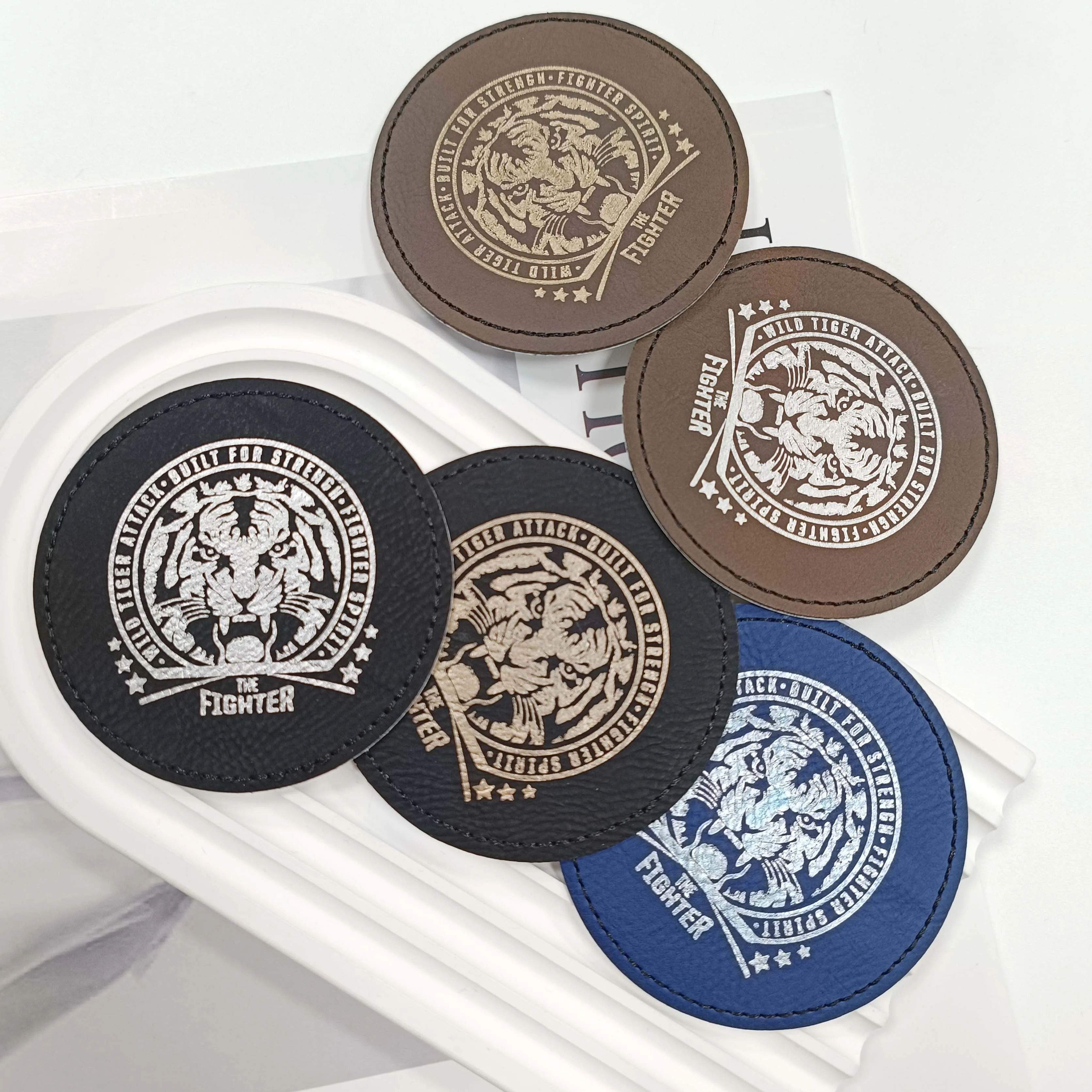 Factory wholesale clothing accessories engraved round leather label creative embroidered color changing leather patch