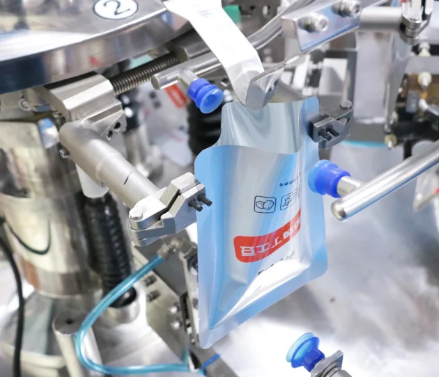 Automatic vertical sachet bag granule filling packing packaging machine for grain rice sugar nut candy salt seed peanuts beans