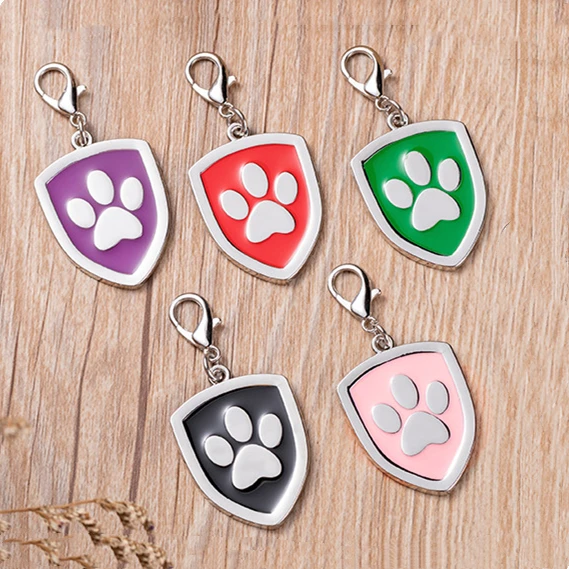 Cartoon footprint shield-shaped zinc alloy dog tag with laser engraving anti-lost ID card pet accessories key chain in stock
