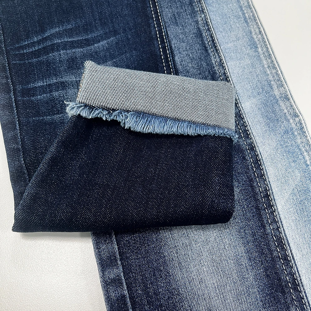 Wholesale Rolls Of 11.5oz Denim Fabric TC Yarn Raw Material 3/1 Twill For Jeans Indigo Rope Dyed Denim Fabrics