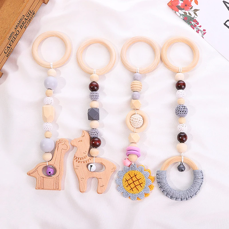 
2021 style 4pcs animal beech and plush baby teethers set wood teether for baby 
