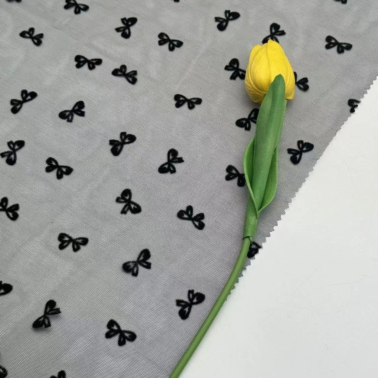 2024 New Luxury 100% Polyester Stretch Mesh 40GSM Black butterfly Velvet Flocking Fabric for Garments Knitted Clothing Stock