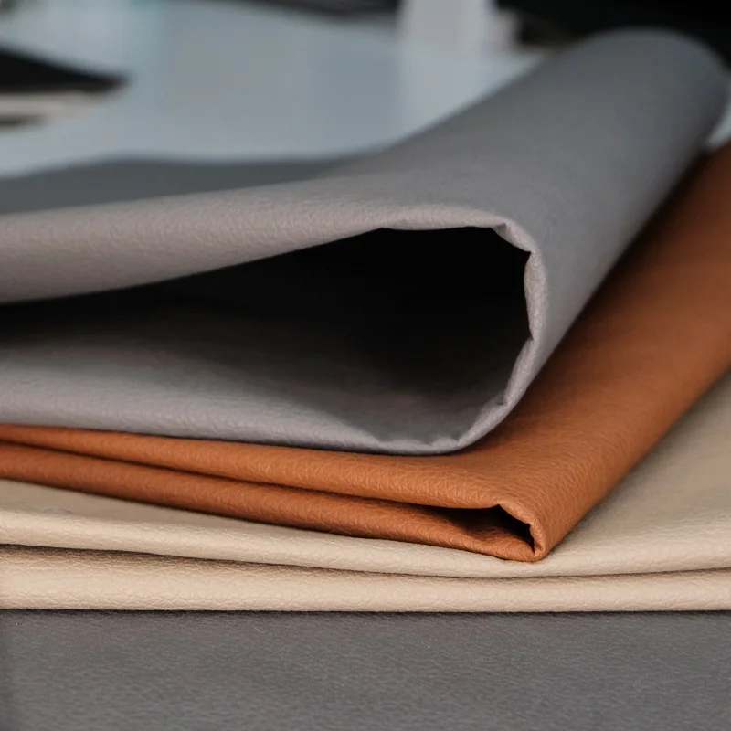 Jiangyin sunrise pvc artificial leather best price non woven backing faux pvc leather for furniture fabric