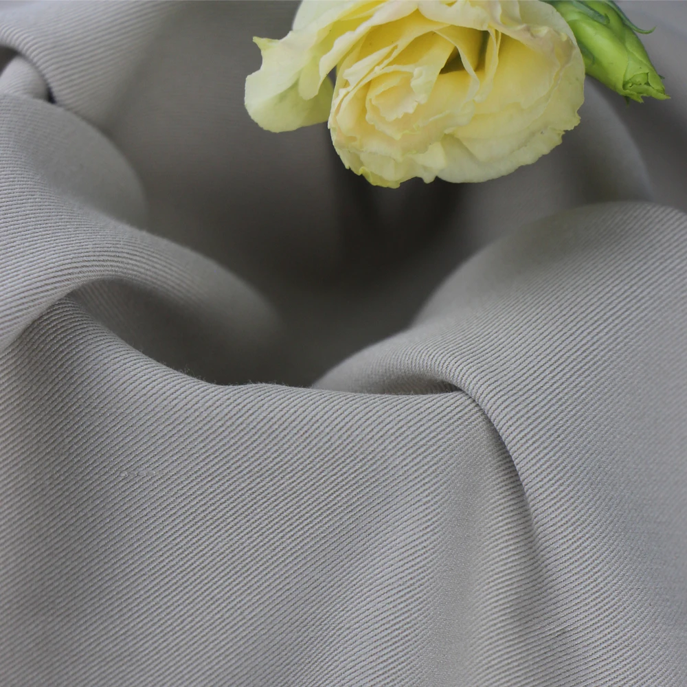 
В наличии на ощупь мягкий полиэстер вискоза с спандексом саржевая ткань для ветрозащитной ткани 