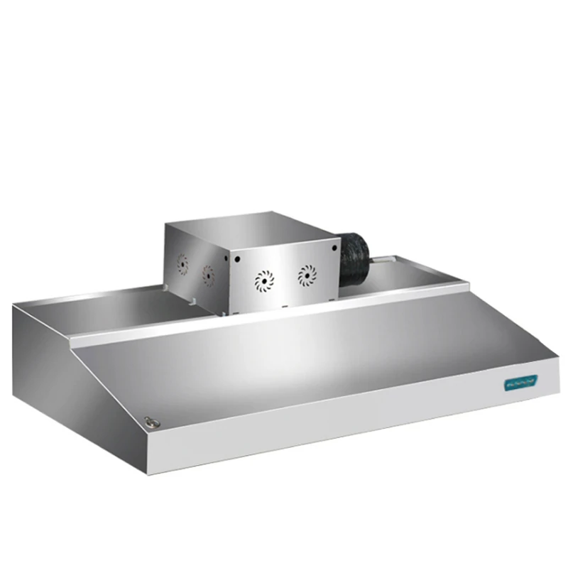 Large suction commercial stainless steel range hood in hotel kitchen