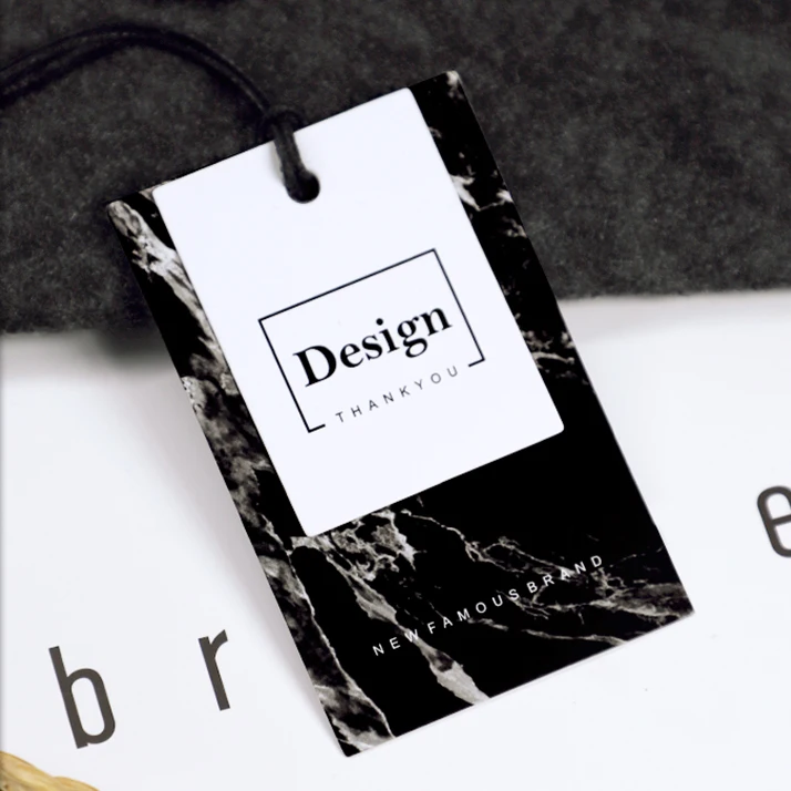 Custom thick black paper uv printing swing hang tags brand name luxury metal eyelet clothing garment hang tag with safety pin