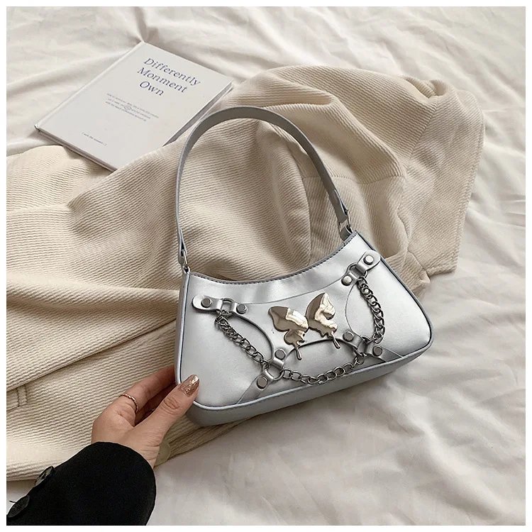 2024 best-selling wholesale mini exquisite bow chain handbag motorcycle street photo women shoulder saddle bag sweet cool style