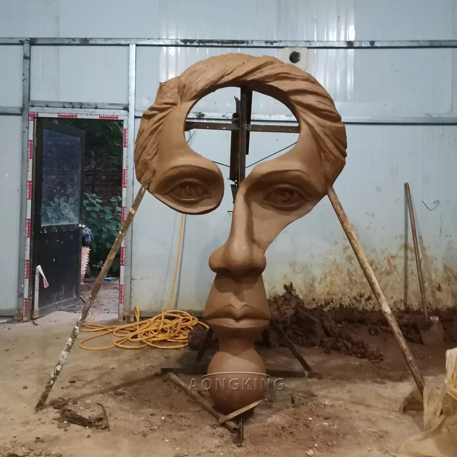 famous modern art  Gardens Abstract Large Face Bronze Statue