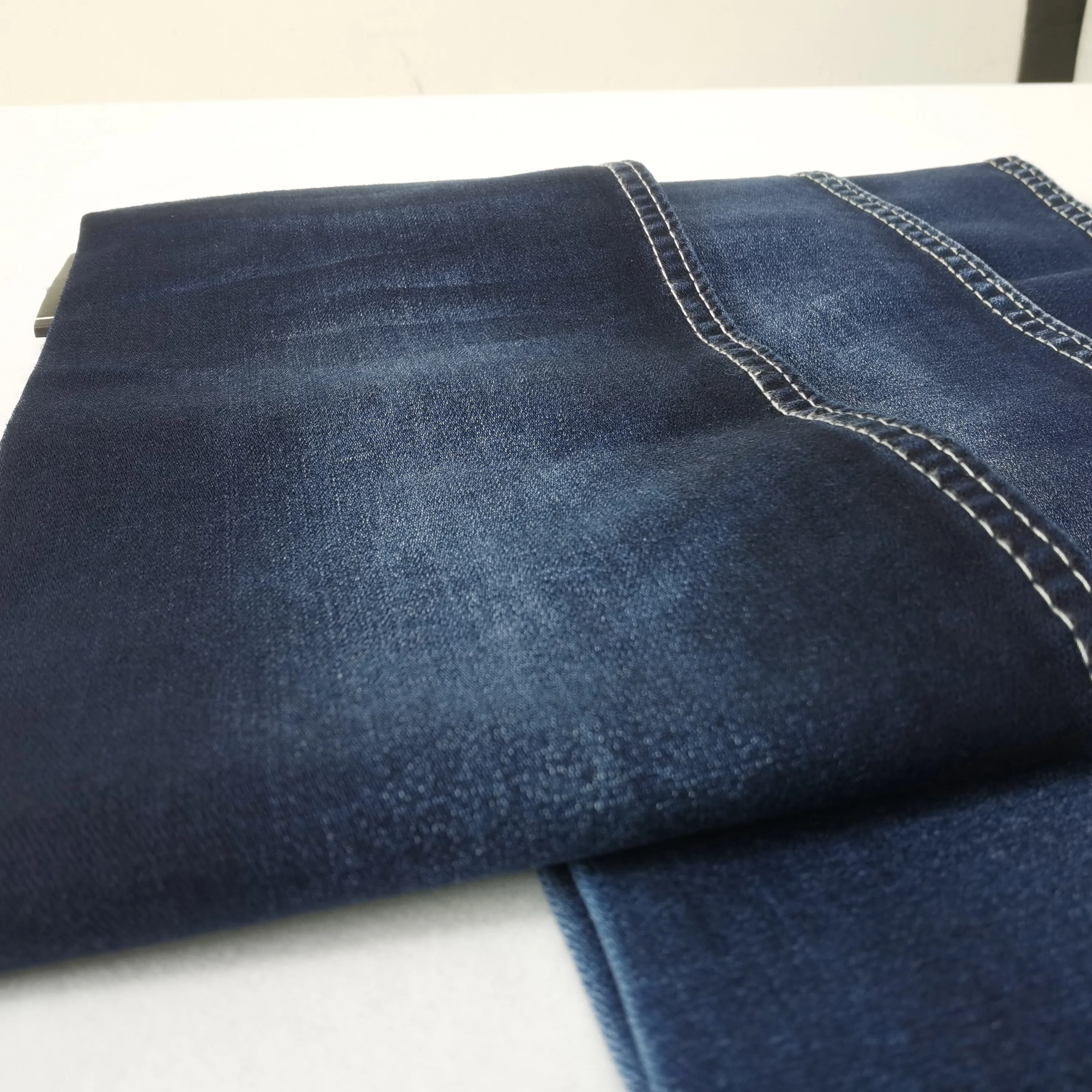 High quality good stretch 10 oz tencel American design netting weaving new development denim fabric
