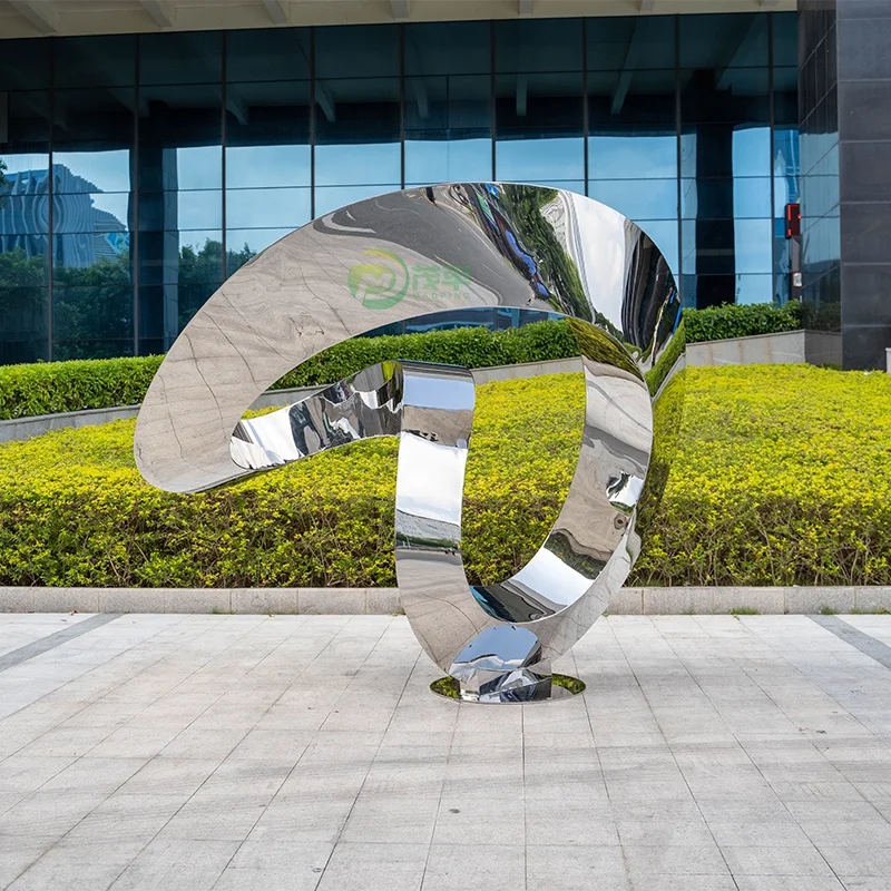 Large stainless steel sculpture in the park business square
