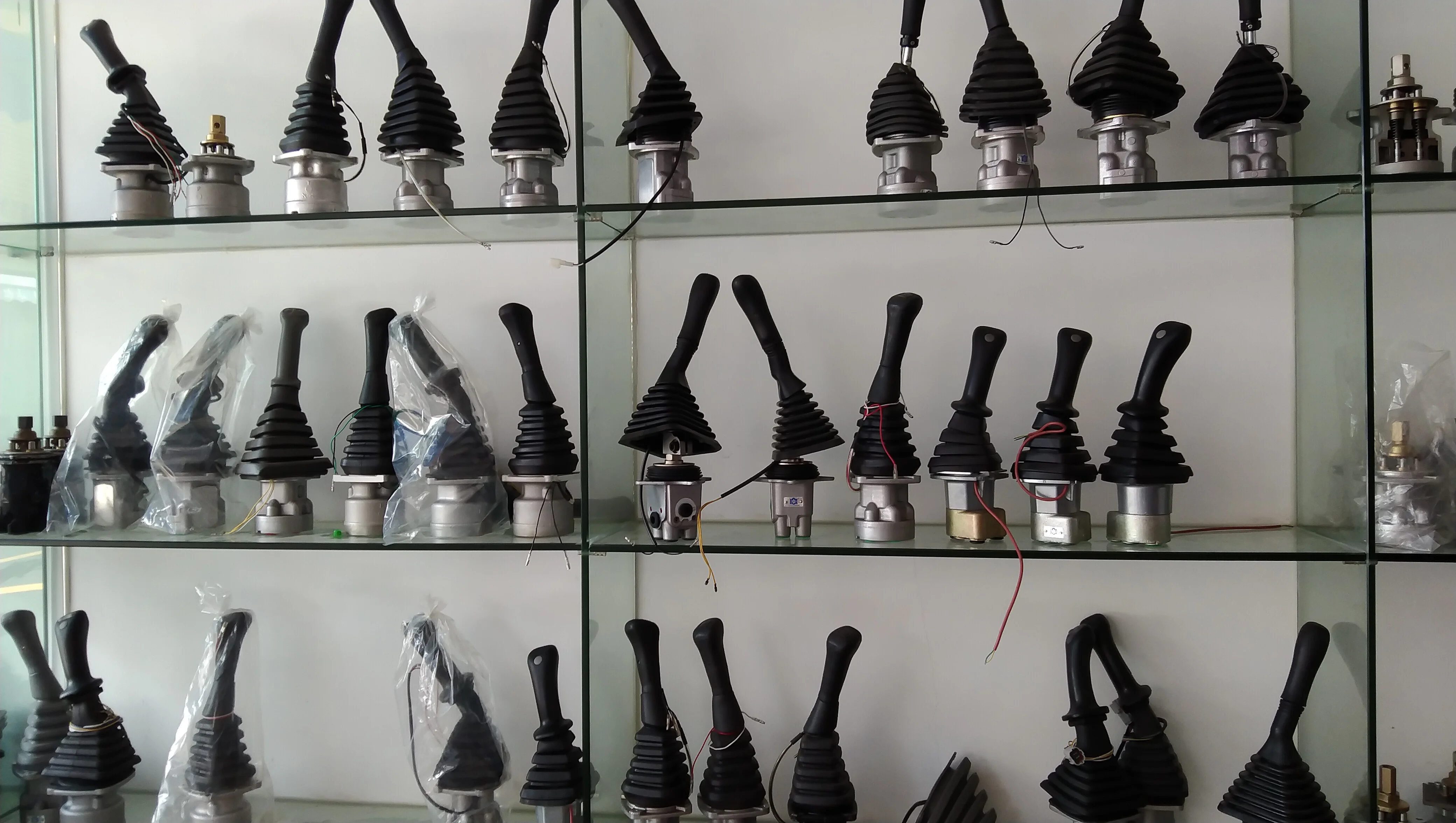 Machinery spare parts Universal joystick assembly with handle control joystick for excavator