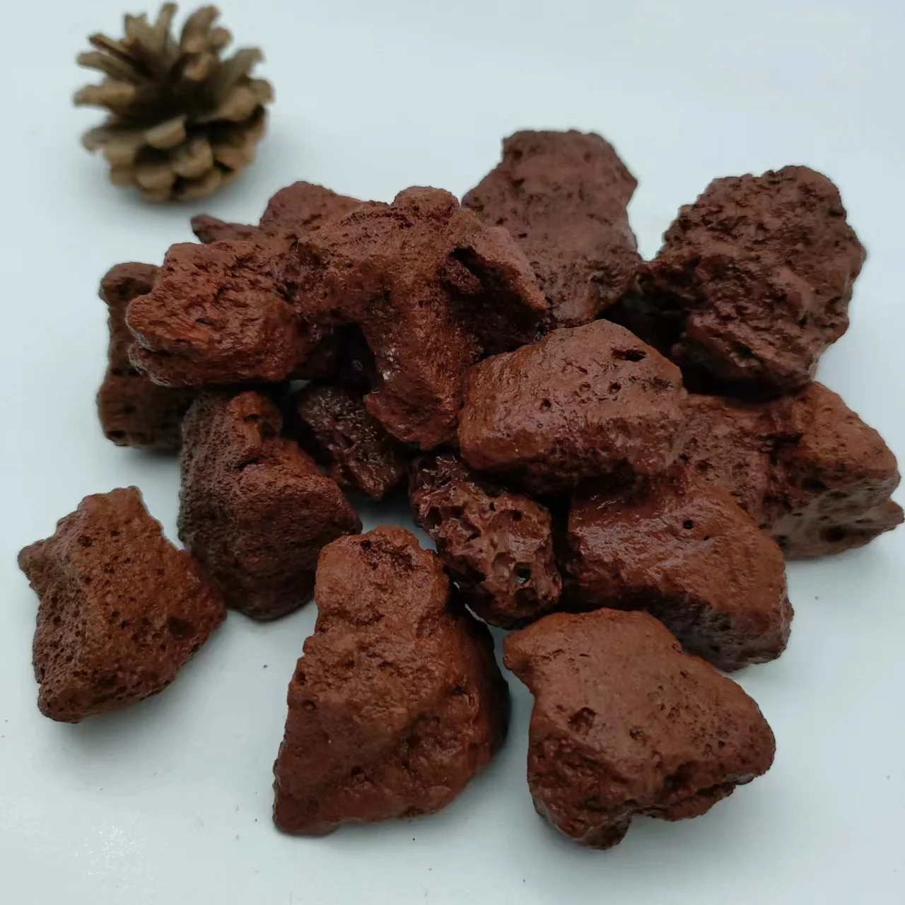 Large Red Volcanic Stone Supplier Factory Selling Volcanic Lava Rock Round Grinding Foot Stone Volcanic Rock Prices