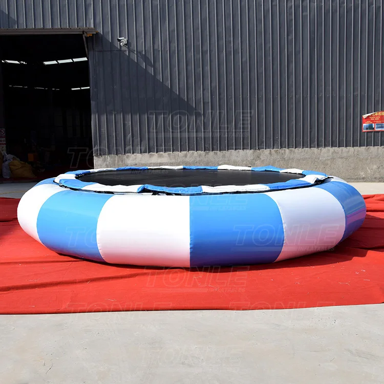 commercial cheap inflatable floating water trampoline with slide for sale