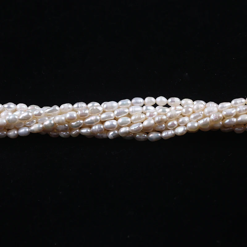 
4-5mm white rice shape freshwater pearl strands cheap beads 