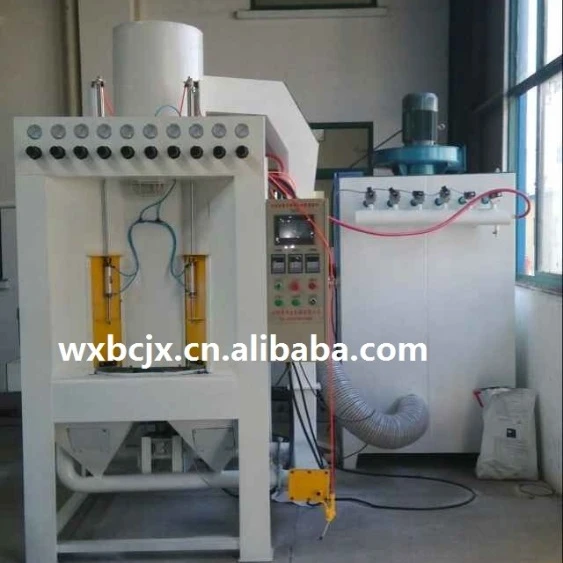 the new automatic rotary table sandblasting machine used for bobbin workpiece surface cleaning