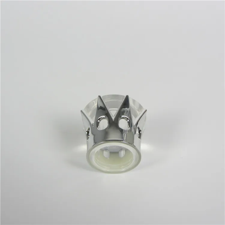 Silver and clear crown plastic cap for perfume bottles