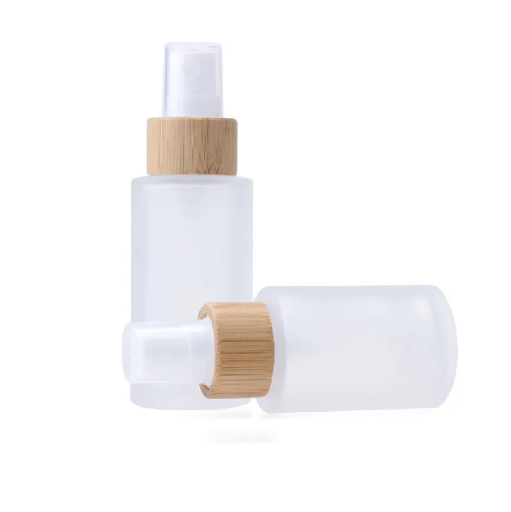 skincare toner Moisturizing glass bottle with bamboo sprayer clear frosted flat shoulder glass essential oil spray bottle 30ml