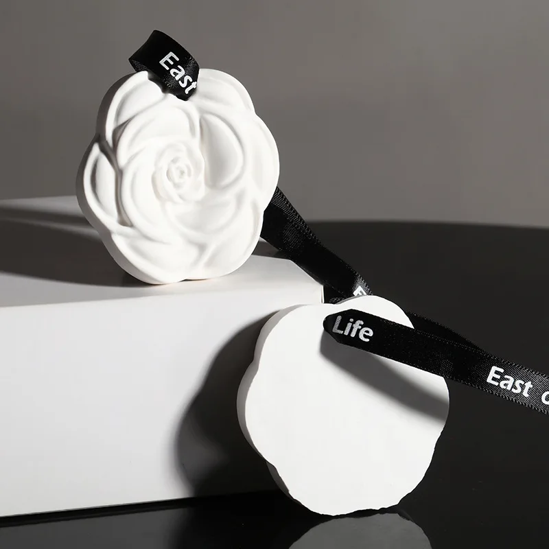 Wholesale camellia car aromatherapy hanging piece home wardrobe aromatherapy wax piece gypsum scented piece air freshener