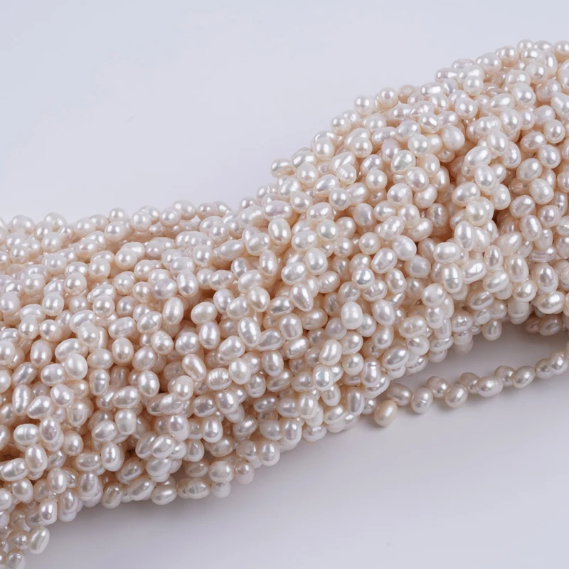 Top Drill Hole 5-6mm AA White Color Natural Loose Beads Real Fresh Water Rice Pearl Strand for jewelry making