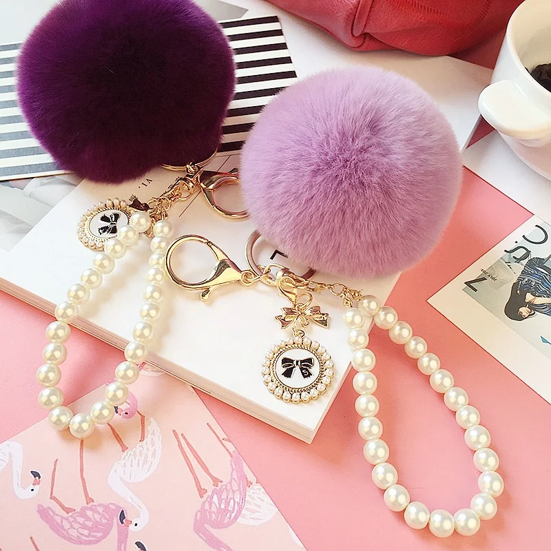 2022 Hot Sale Cheap Promotional Pearl Chain Charm Fluffy Cute 8cm Faux Fur  Key houlde Pompon Fur Ball Pom Keychain