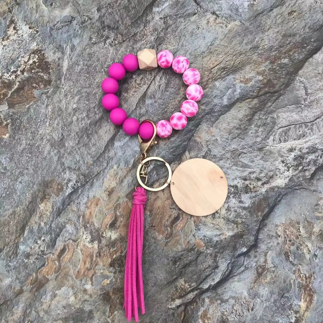Wholesaler Silicone Bead Bracelet Keychain With A Wooden And Round Wood