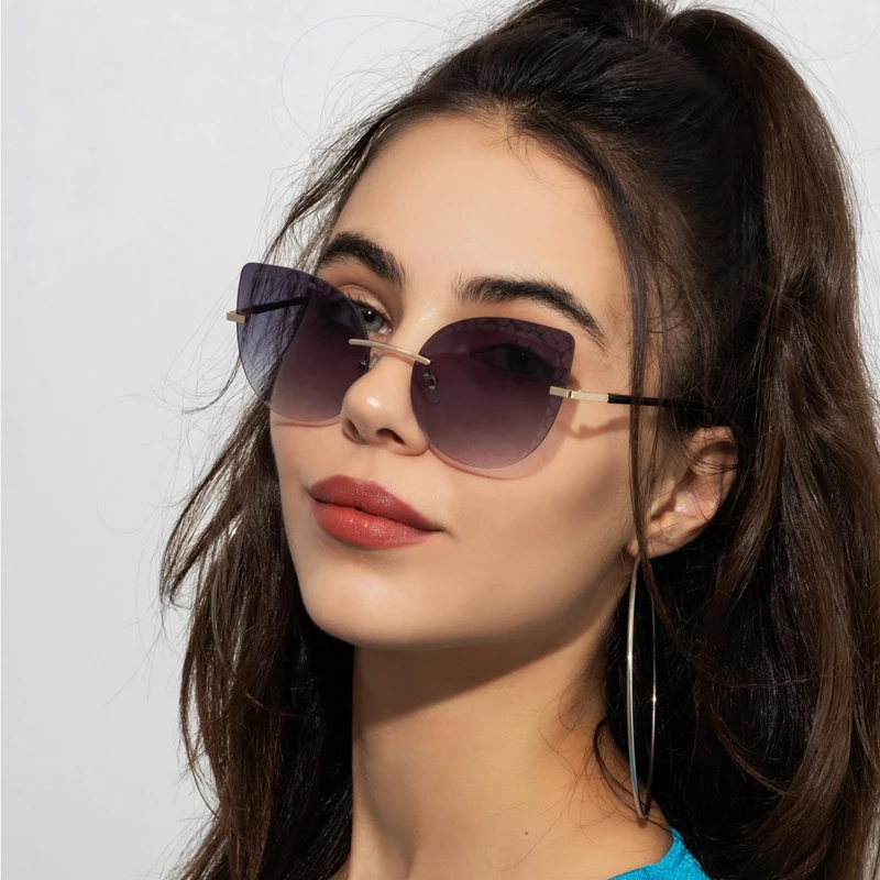 2022 New Fashion Large Frame Cat Eye Rimless Cut Edge Metal Glasses Gradient Sunglasses