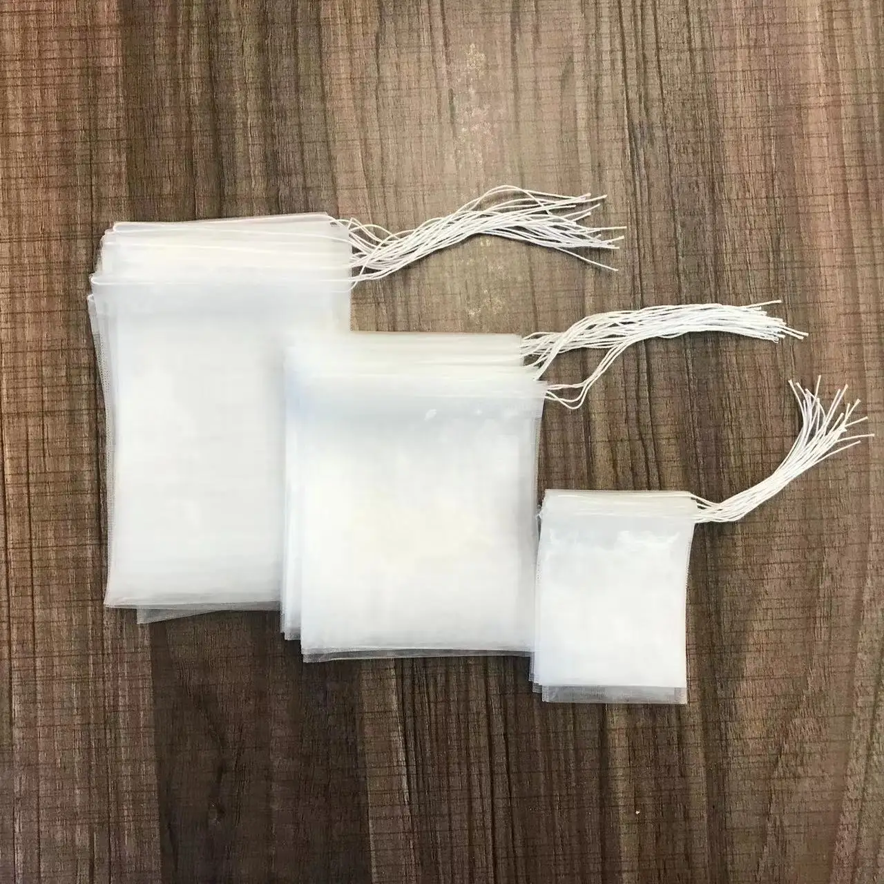 High quality tea bags packaging pla mesh nylon mesh non-woven pyramid tea bag packing material for tea factory