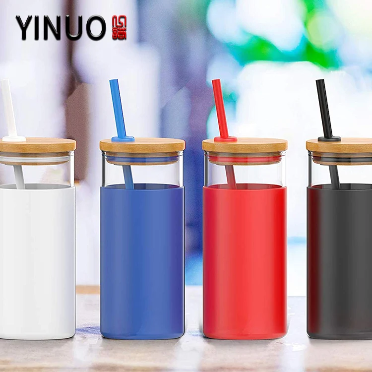 
Glass water tumbler bottle with bamboo lid and silicone sleeve 