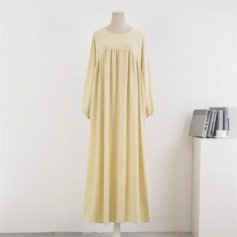 Muslim loose plus size long sleeved solid color pullover robe dress spring and autumn knee length long skirt dress OEM