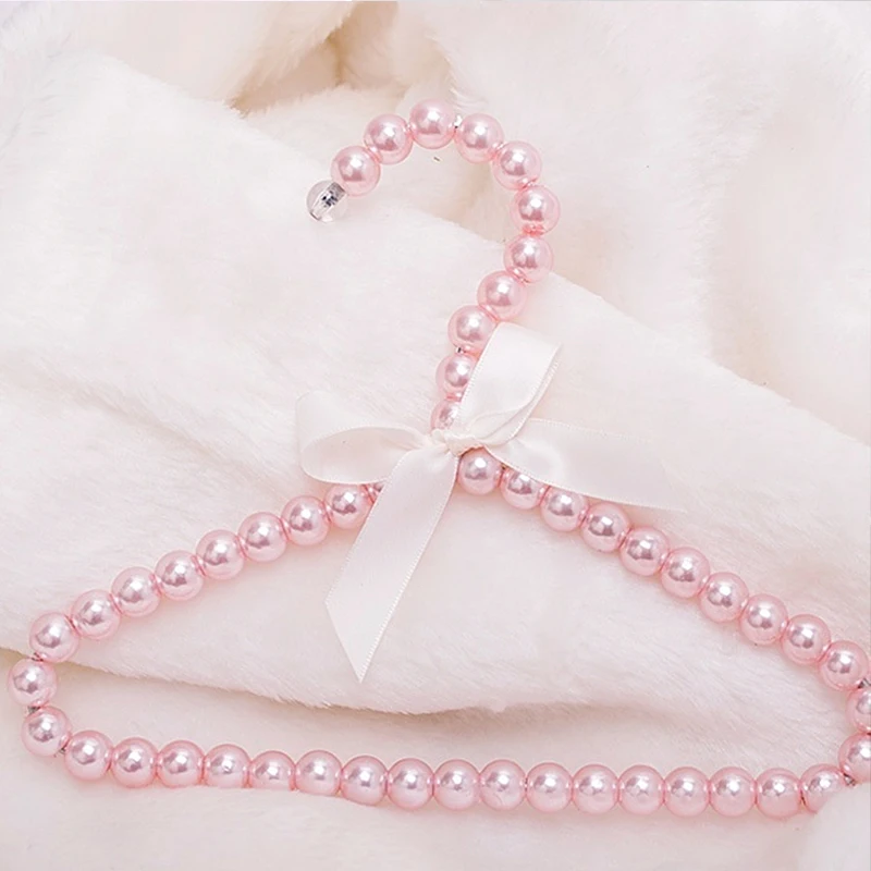 
1Pcs 20cm Children Pearl Clothing Hanger Dog Hangers for Clothes Baby kids Pearl Plastic Pet Hangers 