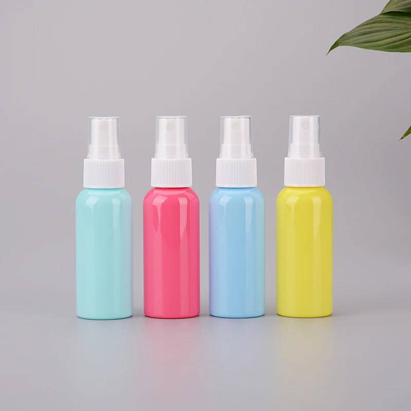 2oz 50ml Wholesale Colorful Empty Plastic Spray Bottle Cosmetic Skin Care Mini PET Bottle with Spray Pump Customized Labeling