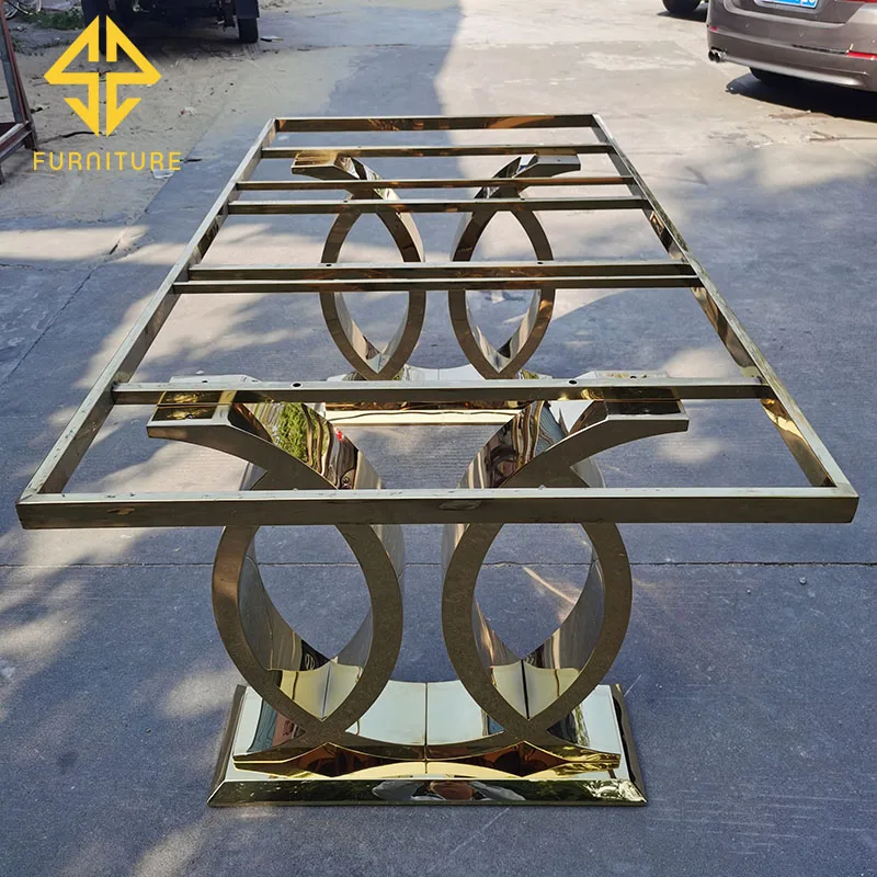Foshan factory sells new design stainless steel golden dining table at low price, which can be matched with glass table and marb