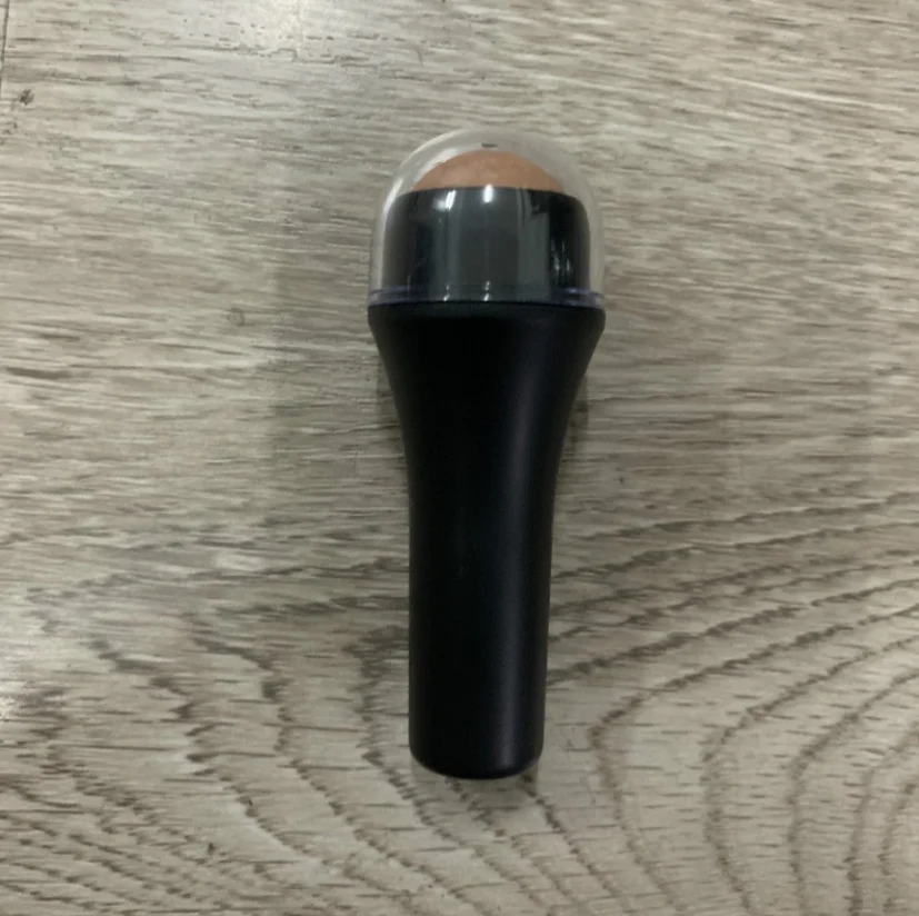 Hot selling high quality natural volcanic stone oil absorption roller facial massage clean skin care tool