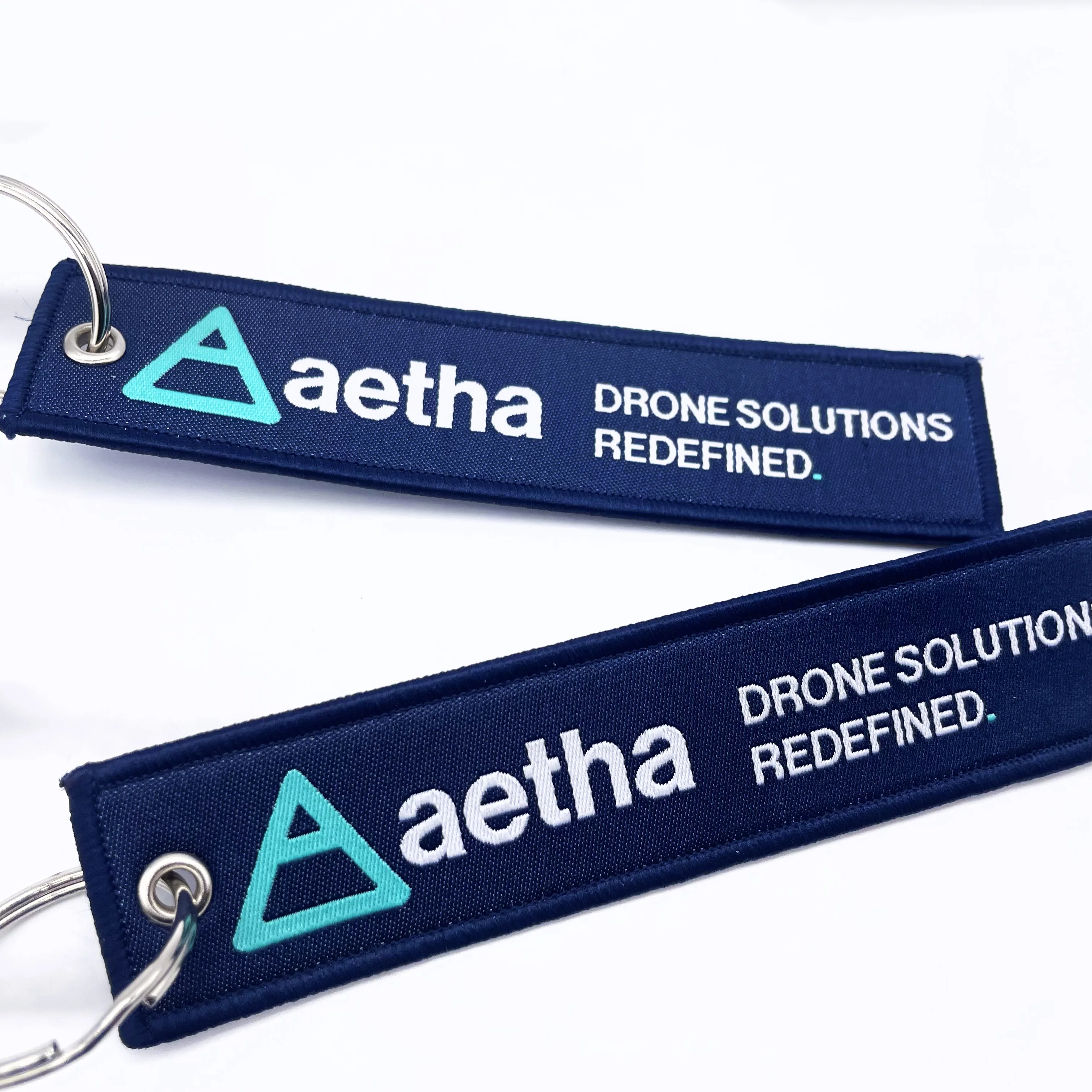 Factory wholesale high quality custom Remove before takeoff design key tag key chian textile fabrics embroidery woven key rings