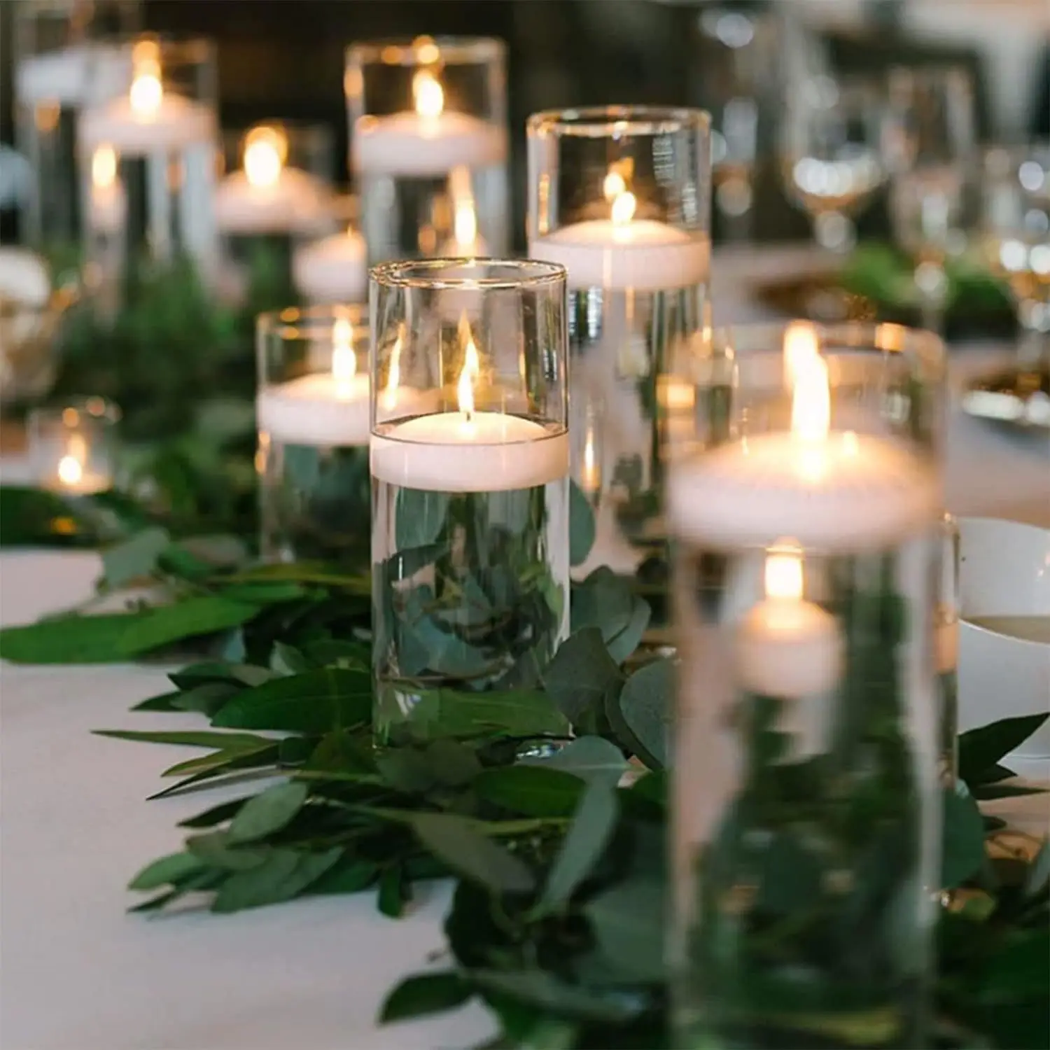 wholesale paraffin wax high quality 3'1.3inch white unscented floating candles for wedding party restaurant