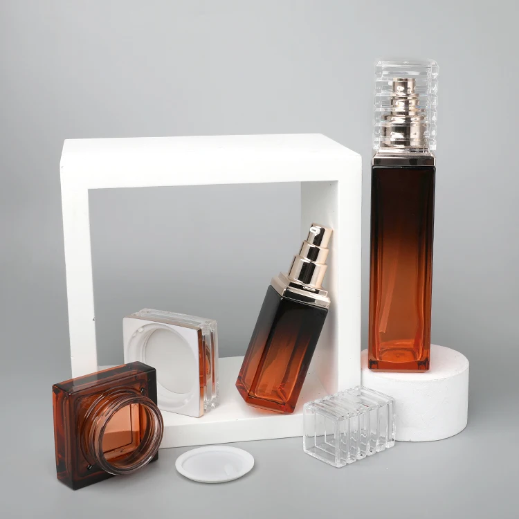 factory wholesale high quality Skincare Packing Set Amber Cosmetic Face Cream Jar Square Glass Body Lotion Bottle with Gold Pump