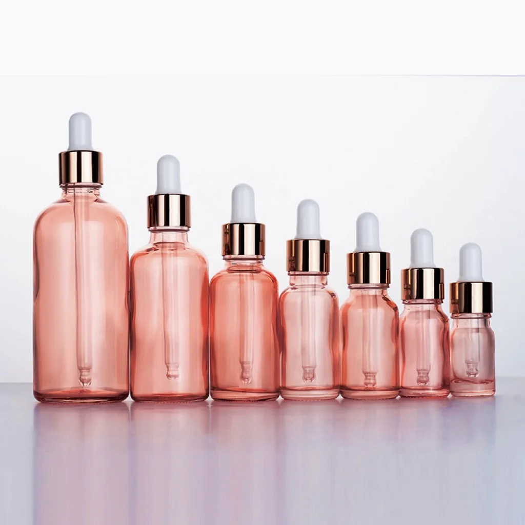 Luxury 0.5oz 1oz 2 oz 10ml 15ml 20ml 30ml 50ml 100ml pink essential oil facial serum glass dropper bottle with rose gold caps