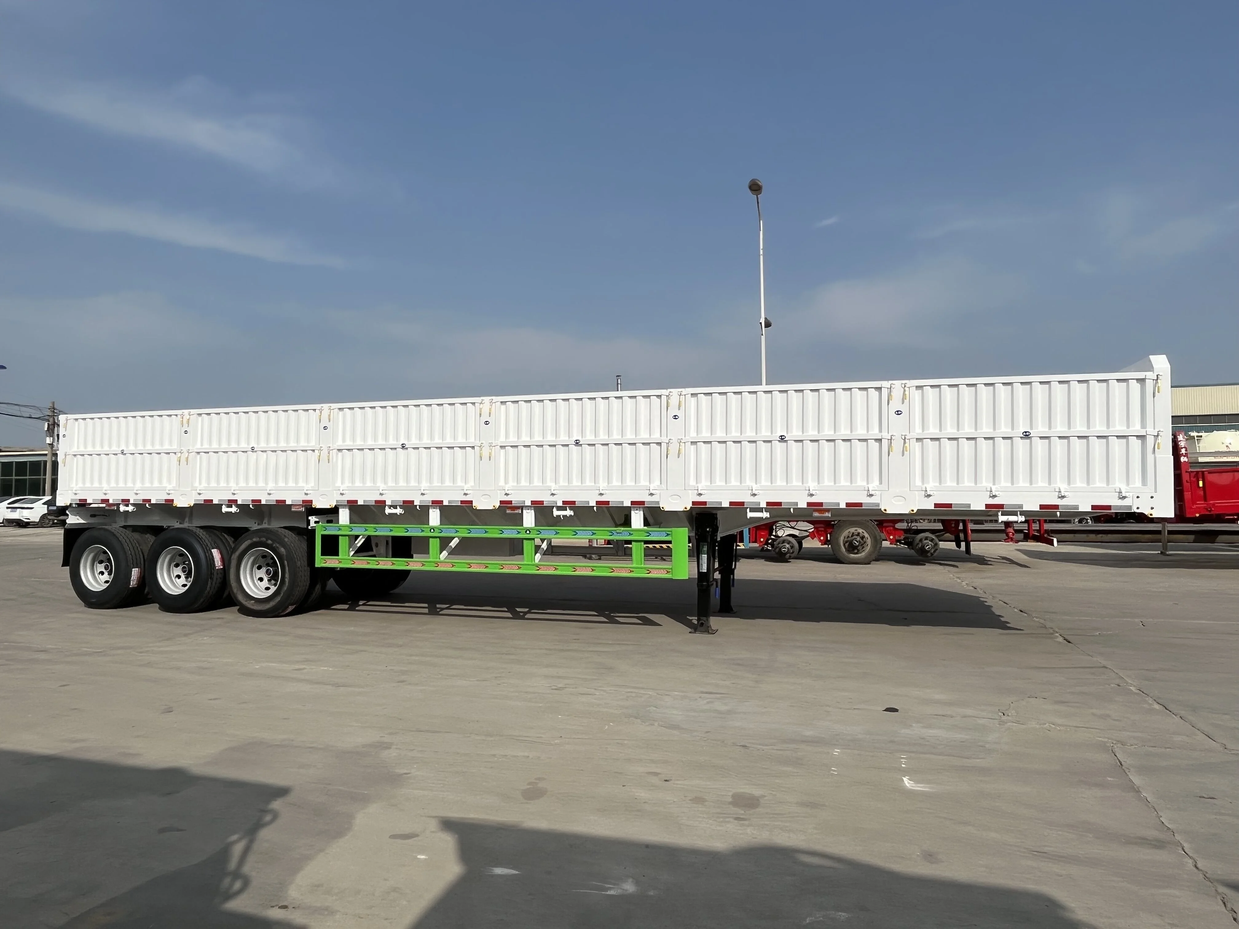 2024 Hot Sell 12.6 Meters Drop Side Semi Trailer with Twist Locks