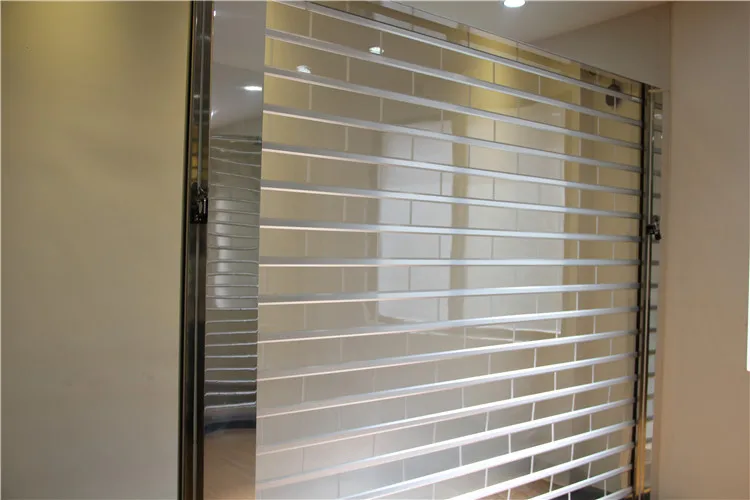 Foshan Plastic Accordion  Transparent Pvc Sound Proof Roller Shutters Door