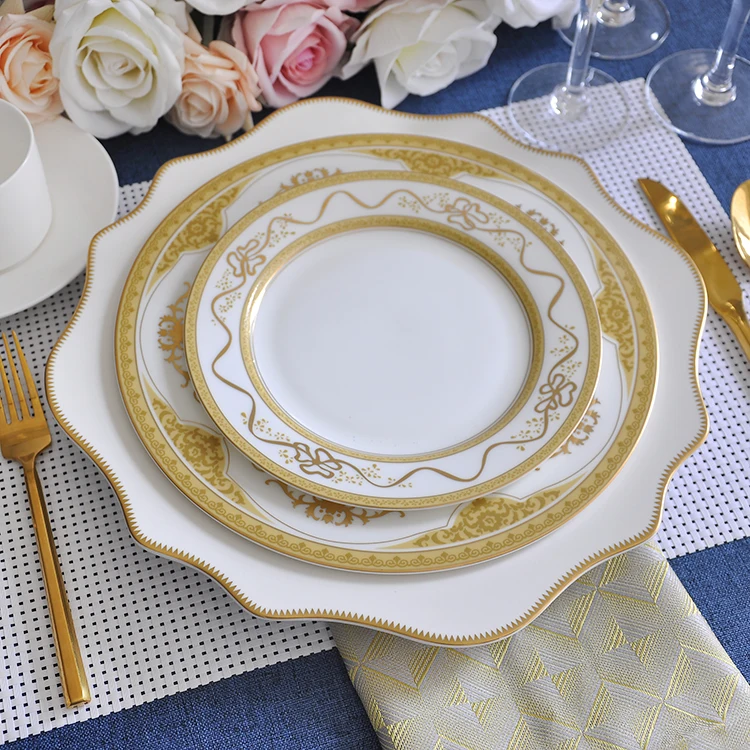 wholesale tooth wedge shaped white and gold rim porcelain ceramic charger dinner plates for wedding decoration