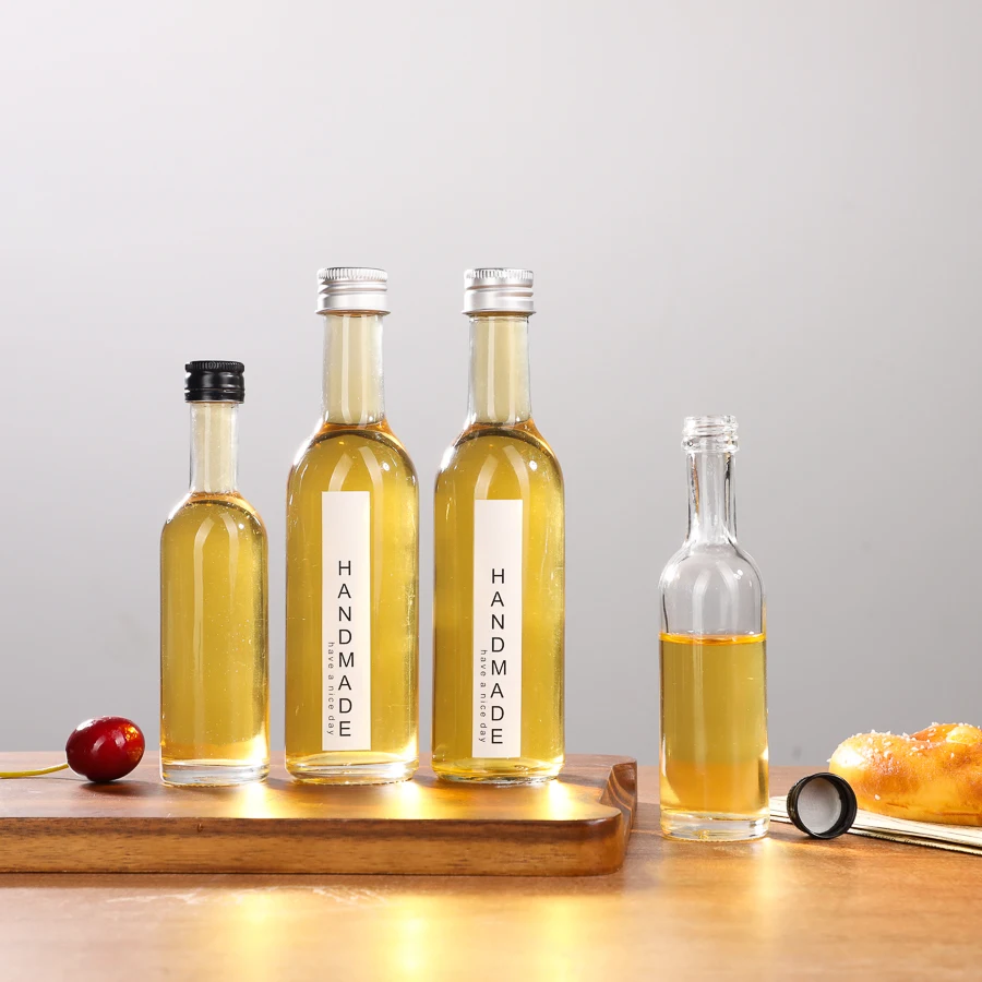 50ml 100ml mini whisky vodka glass wine bottle portable round shoulder clear long neck small spirits bottle with screw cap