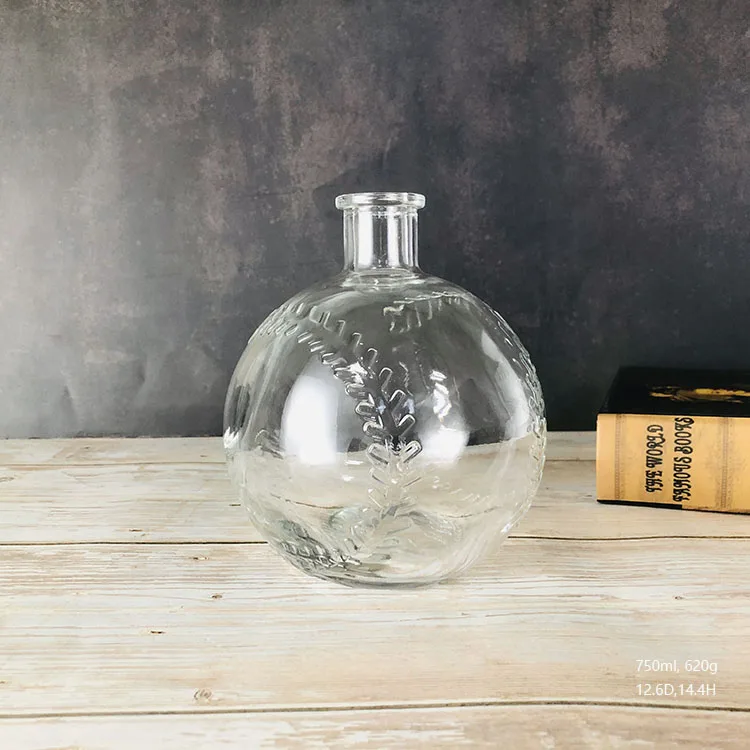 Ball Shape Whisky 750ml Custom Embossed Clear Glass Liquor Bottle