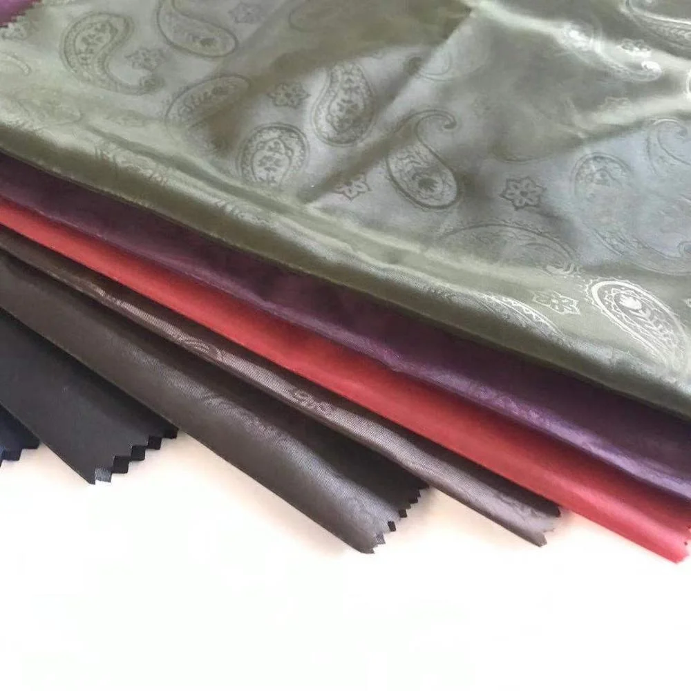 190T 210T Embossed Polyester Taffeta Lining Fabric 53GSM Dobby Design For Garment