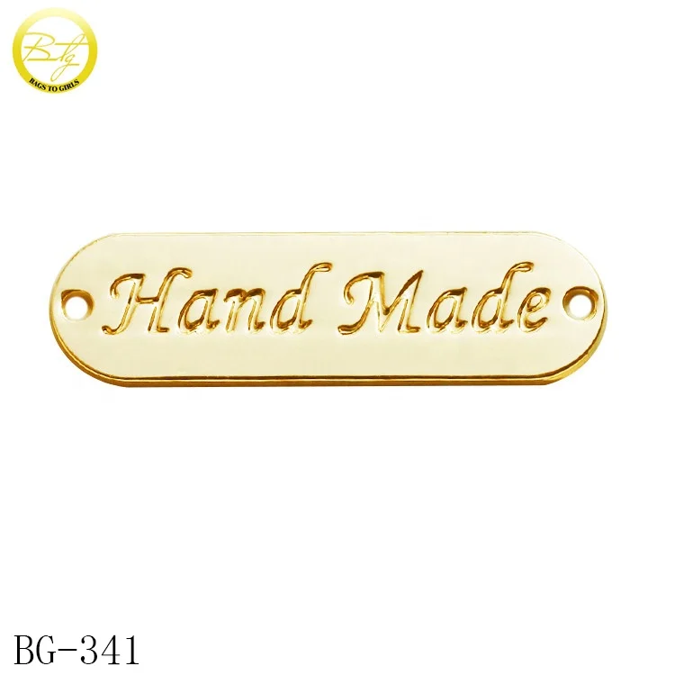 Wholesale alloy metal handmade tags engraving name gold color metal label badge for swimwear