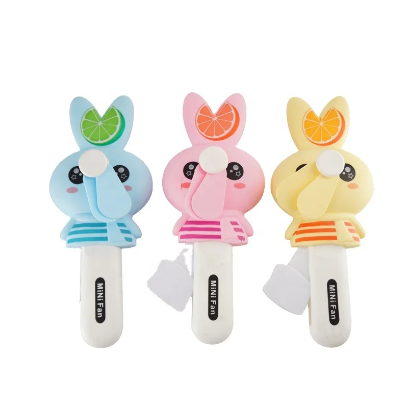 Wholesale Summer Toy Rabbit Portable Palm Mini Hand Pressure Fan Toy With Pressed Candy