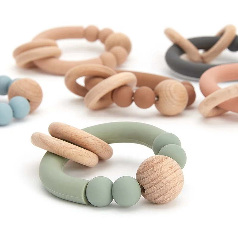 New Design Sensory Baby Teething Toys Rattle Soft Bpa Free Wood Baby Teether Ring Silicone Teether