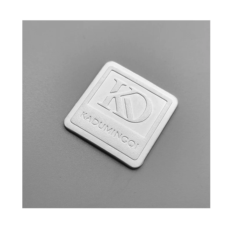 Wholesale cheap white paint oval customized garment logo label leather patch