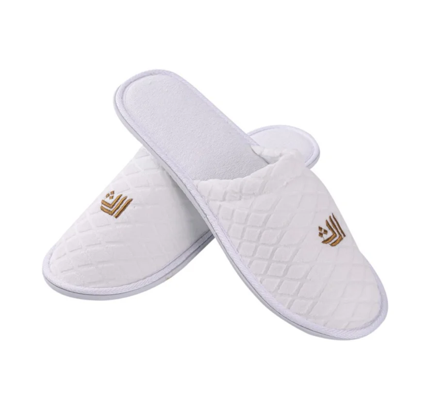 China Wholesale Custom Hotel Bedroom Bathroom Slippers Disposable Hotel Coral Fleece Slipper for Guest (1600488757955)