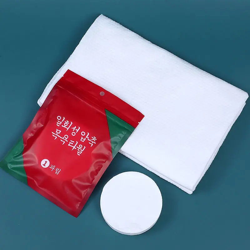 Customized 135 * 60 cm independent packaging biodegradable non-woven fabric travel hotel disposable white bath towel